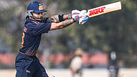 | Photo: PTI/Shailendra Bhojak : Delhi's Virat Kohli plays a shot during the Vijay Hazare Trophy 2025-26 cricket match between Gujarat and Delhi, at BCCI Centre of Excellence Ground, in Bengaluru.