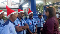 Special Arrangement  : Kavya Ladkat and her staff at Ladkat Brothers Service Station celebrated Christmas with Red Santa caps amid threats by Hindu group of men 