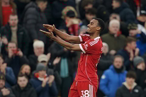Liverpool's Ryan Gravenberch celebrates after scoring the opening goal during the English Premier League soccer match between Liverpool and Wolverhampton Wanderers in Liverpool.