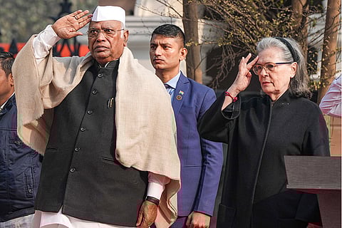 Congress President Mallikarjun Kharge, left, and party MP Sonia Gandhi during the flag-hoisting ceremony marking the 140th Foundation Day of the party, at Indira Bhawan in New Delhi.