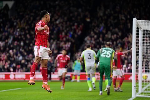 Nottingham Forest's Omari Hutchinson celebrates scoring his side's first goal during the Premier League match between Nottingham Forest and Manchester City, in Nottingham, England.