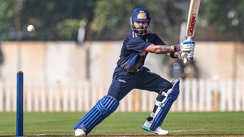 Delhi's Virat Kohli plays a shot during the Vijay Hazare Trophy 2025-26 cricket match between Gujarat and Delhi, at BCCI Centre of Excellence Ground, in Bengaluru. - | Photo: PTI/Shailendra Bhojak