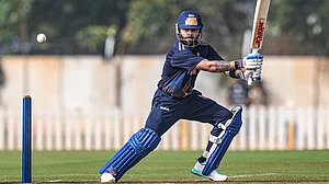 | Photo: PTI/Shailendra Bhojak : Delhi's Virat Kohli plays a shot during the Vijay Hazare Trophy 2025-26 cricket match between Gujarat and Delhi, at BCCI Centre of Excellence Ground, in Bengaluru.