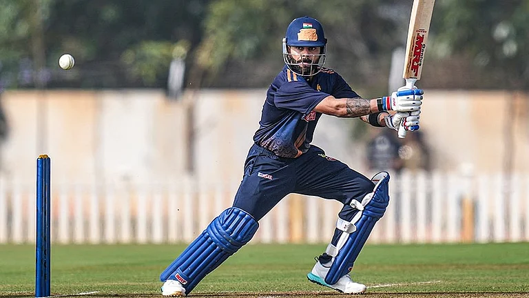Delhi's Virat Kohli plays a shot during the Vijay Hazare Trophy 2025-26 cricket match between Gujarat and Delhi, at BCCI Centre of Excellence Ground, in Bengaluru. - | Photo: PTI/Shailendra Bhojak