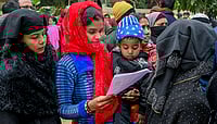 ECI Clears Plantation Records For Voter Enrolment In North Bengal Districts | Photo: PTI : Women wait to enroll for special intensive revision of electoral rolls at Phulia BDO office, in Nadia district, West Bengal.