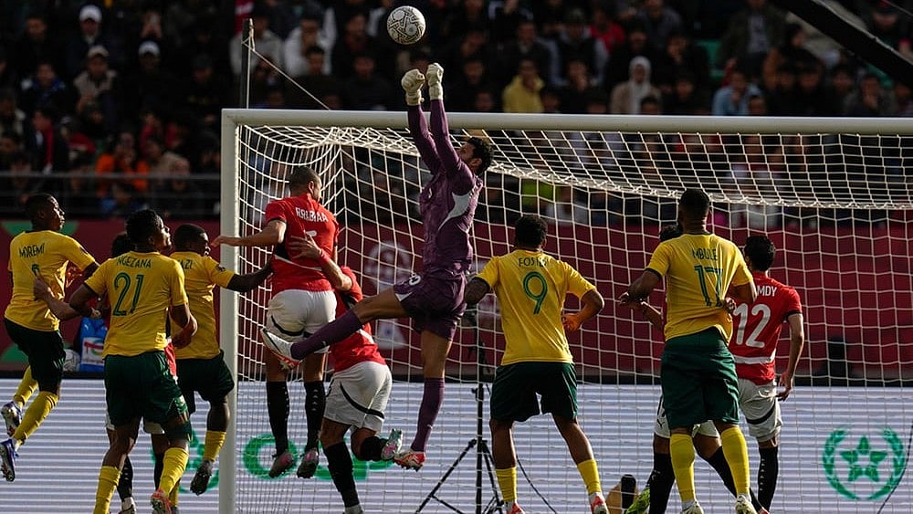 Egypt's goalkeeper Mohamed Sobhy clears the ball during the Africa Cup of Nations group B soccer match between Egypt and South Africa in Agadir, Morocco. - | Photo: AP/Themba Hadebe