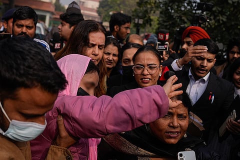 Survivor in the Unnao rape case leaves from Supreme Court, in New Delhi. Supreme Court stayed the Delhi High Court's order suspending the life sentence of expelled BJP leader Kuldeep Singh Sengar in the 2017 Unnao rape case.