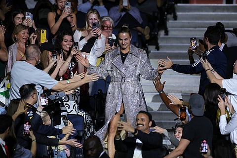 Aryna Sabalenka makes her way to the court for the Battle of the Sexes match between Aryna Sabalenka and Nick Kyrgios in Dubai, United Arab Emirates.