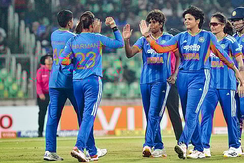 India's Arundhati Reddy celebrates with teammates after taking the wicket of Sri Lanka’s Hasini Perera during the fourth T20 International cricket match of a series between India Women and Sri Lanka Women, at Greenfield International Stadium, in Thiruvananthapuram, Kerala.
