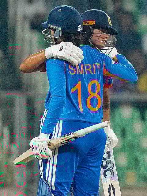 India's Smriti Mandhana, front, celebrates her half century with Shafali Verma during the fourth T20 International cricket match of a series between India Women and Sri Lanka Women, at Greenfield International Stadium, in Thiruvananthapuram, Kerala.