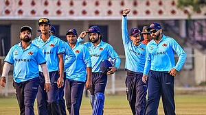 | Photo: PTI : Mumbai’s Rohit Sharma, right, and others celebrate after winning a Vijay Hazare Trophy 2025-26 cricket match between Mumbai and Uttarakhand, at Sawai Mansingh Stadium, in Jaipur, Rajasthan.