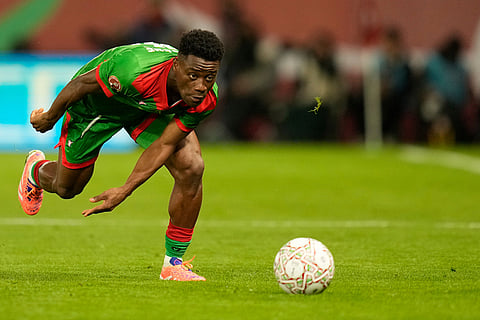 Burkina Faso's Kouassi Kan in action during the Africa Cup of Nations group E soccer match between Algeria and Burkina Faso in Rabat, Morocco.