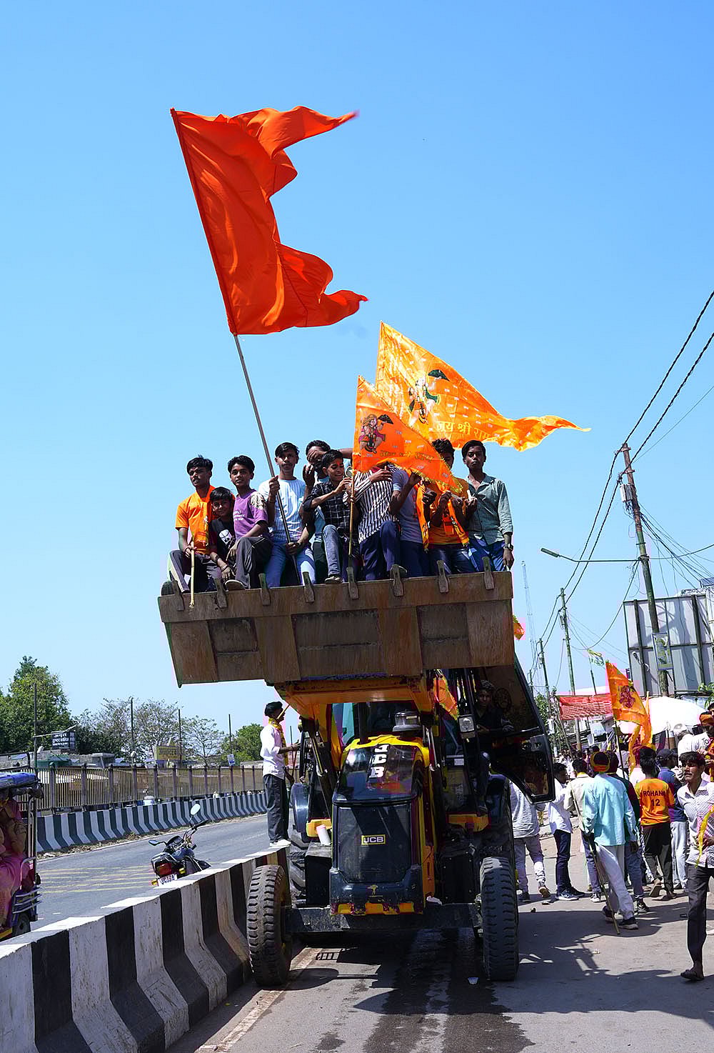 Bulldozer with regional flags in Uttar Pradeshs Muzaffarnagar