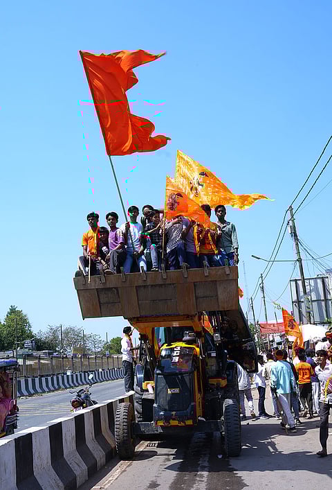 Bulldozer with regional flags in Uttar Pradesh's Muzaffarnagar