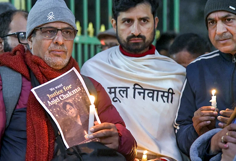 Members of students' organisations and locals participate in a candlelight march at Gandhi Park protesting the assault and death of Tripura student Angel Chakma, in Dehradun, Monday - RAHULGROVER
