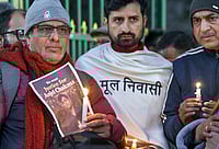 RAHULGROVER :  Members of students' organisations and locals participate in a candlelight march at Gandhi Park protesting the assault and death of Tripura student Angel Chakma, in Dehradun, Monday