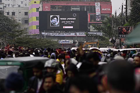 A portrait of former Bangladeshi Prime Minister Khaleda Zia is displayed on a digital screen near the hospital where she died, in Dhaka, Bangladesh.