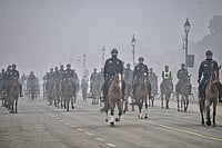 | Photo: PTI : Indian President's Bodyguard on horses during rehearsals ahead of Republic Day celebrations at Kartavya path, in New Delhi.