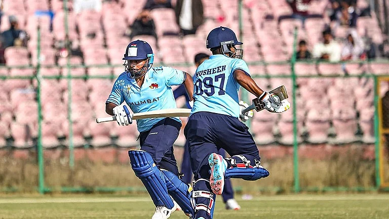 Mumbai's Sarfaraz Khan and Musheer Khan run between the wickets during the Vijay Hazare Trophy 2025-26 cricket match between Mumbai and Uttarakhand, at Sawai Mansingh Stadium, in Jaipur. - | Photo: PTI