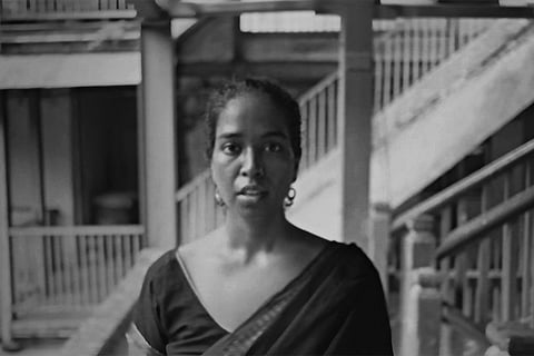 One late morning as she turned to look her old earthen pot cracked and broke over the gas flame and the watery rice spilled over and momentarily sizzled before dousing the fire and all that was left moving were rows of unhurried timid smoke which reached the ceiling that was covered with layers of black soot and that was the only honest witness to her long history in that room