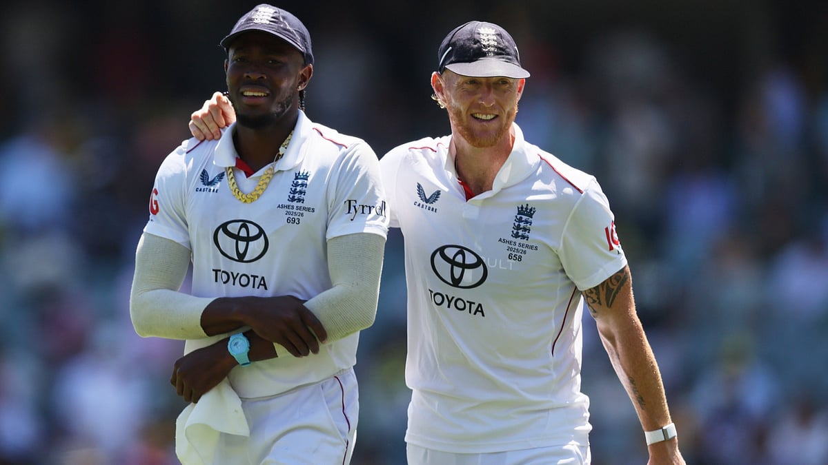 England's Ben Stokes, right, walks with teammate Jofra Archer after dismissing Australia during play on day four of the third Ashes cricket test between England and Australia in Adelaide, Australia, Saturday, Dec. 20, 2025. - | Photo: AP/James Elsby