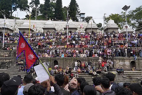 A group of people at a funeral ceremony at Pasupati after the Gen-Z protests in Nepal