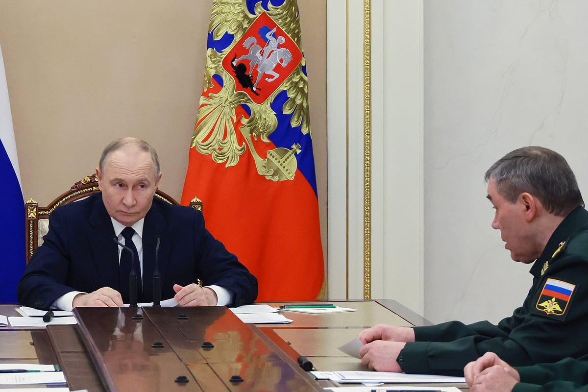 Russian President Vladimir Putin, left, listens to Russian Chief of General Staff Gen. Valery Gerasimov during a meeting with senior military officers at the Kremlin in Moscow, Russia, Monday, Dec. 29, 2025.  - Mikhail Metzel/Sputnik, Kremlin Pool Photo via AP