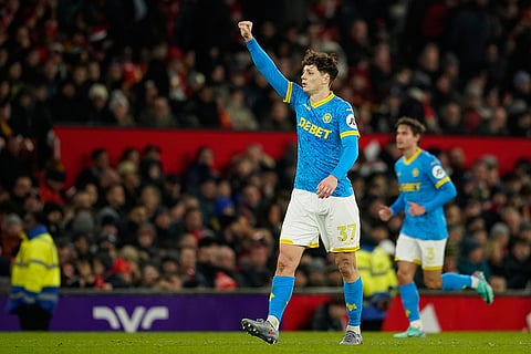 Wolverhampton Wanderers' Ladislav Krejci celebrates after scoring during the English Premier League soccer match between Manchester United and Wolverhampton Wanderers in Manchester, England.