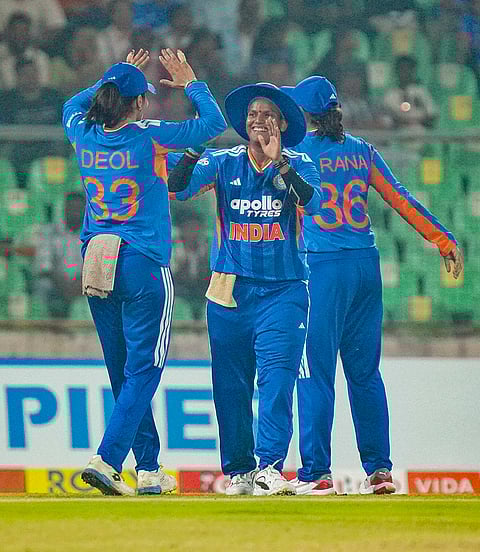India's Deepti Sharma celebrates a wicket with teammate Harleen Deol during the fifth T20 International cricket match of a series between India Women and Sri Lanka Women, at Greenfield International Stadium, in Thiruvananthapuram, Kerala.