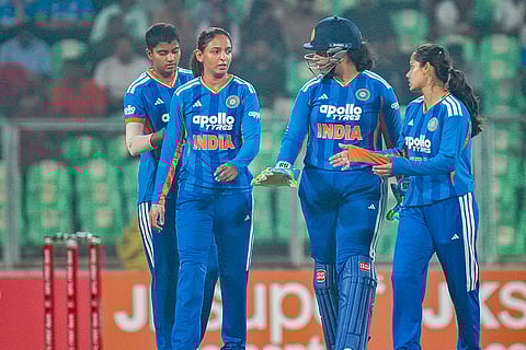 India's captain Harmanpreet Kaur with teammates during the fifth T20 International cricket match of a series between India Women and Sri Lanka Women, at Greenfield International Stadium, in Thiruvananthapuram.