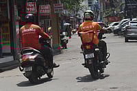 Source: IMAGO / NurPhoto  : App based food delivery persons from Zomato and Swiggy delivering food in Kolkata, India