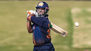 | Photo: PTI/Shailendra Bhojak : Delhi's captain Rishabh Pant plays a shot during the Vijay Hazare Trophy 2025-26 cricket match between Gujarat and Delhi, at BCCI Centre of Excellence Ground, in Bengaluru.