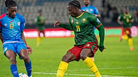 Mozambique Vs Cameroon LIVE Score, AFCON 2025: The Mambas Lock Horns Against Indomitable Lions | Photo: AP : Congo's Joris Kayembe, left, and Cameroon's Etta Eyong battle for the ball during a World Cup qualifying soccer match against Cameroon in Rabat, Morocco.