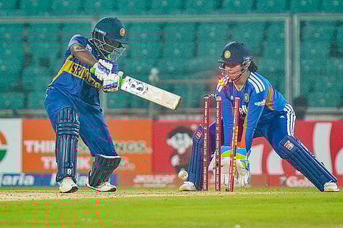 Sri Lanka's Hasini Perera gets clean bowled during the fifth T20 International cricket match of a series between India Women and Sri Lanka Women, at Greenfield International Stadium, in Thiruvananthapuram, Kerala.