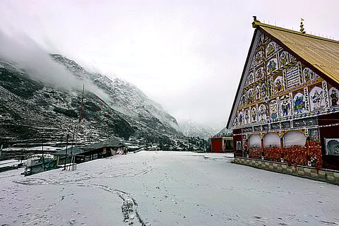 Fresh snowfall occurs near the 'Machail Bhawan Temple', in Kishtwar district, Jammu and Kashmir.