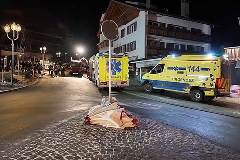 Flowers are laid in the area where a fire broke out leaving people dead and injured, during New Year’s celebration, in Crans-Montana, Swiss Alps, Switzerland.