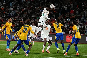 | Photo: AP/Themba Hadebe : Ivory Coast's Evann Guessand scores during the Africa Cup of Nations group F soccer match between Gabon and Ivory Coast, in Marrakech, Morocco.
