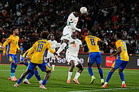 | Photo: AP/Themba Hadebe : Ivory Coast's Evann Guessand scores during the Africa Cup of Nations group F soccer match between Gabon and Ivory Coast, in Marrakech, Morocco.