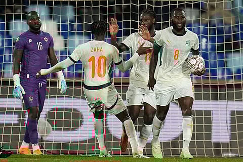 Ivory Coast players celebrate after Jean-Philippe Krasso scores during the Africa Cup of Nations group F soccer match between Gabon and Ivory Coast, in Marrakech, Morocco.