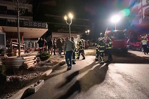 Rescue staffers and firefighters in the area where a fire broke out leaving people dead and injured, during New Year’s celebration, in Crans-Montana, Swiss Alps, Switzerland.