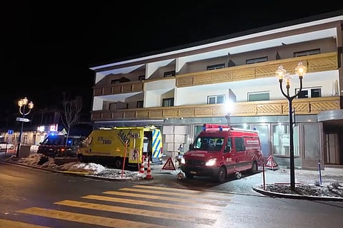 Rescuers in the area where a fire broke out leaving people dead and injured, during New Year’s celebration, in Crans-Montana, Swiss Alps.