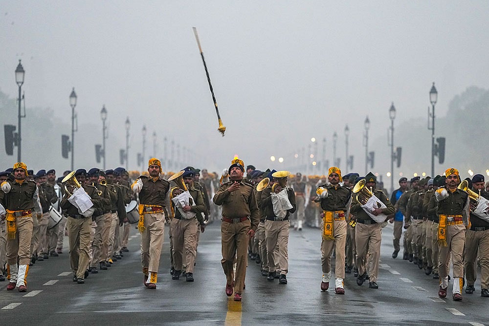 Central Industrial Security Force (CISF) officials during a rehearsal ahead of the Republic Day, at Kartavya Path in New Delhi. - | Photo: PTI/Ravi Choudhary