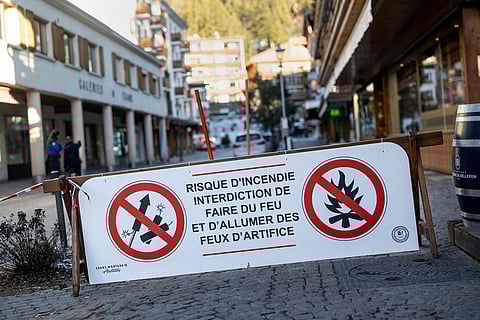 A banner stating that fireworks are prohibited due to the risk of fire is pictured near the area where a fire broke out  at the Le Constellation bar and lounge leaving people dead and injured, during New Year’s celebration, in Crans-Montana, Swiss Alps, Switzerland.