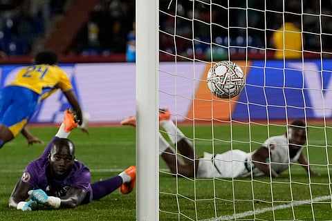 Ivory Coast's Bazoumana Touré scores during the Africa Cup of Nations group F soccer match between Gabon and Ivory Coast, in Marrakech, Morocco.