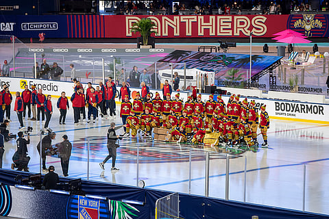 The Florida Panthers team pose for a picture during practice for the NHL Winter Classic outdoor hockey game at loanDepot Park in Miami. 