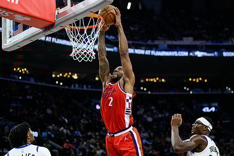 Los Angeles Clippers forward Kawhi Leonard (2) dunks during the first half of an NBA basketball game against the Utah Jazz,  in Inglewood, California.