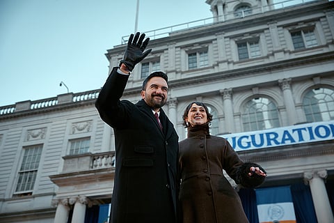 Mayor Zohran Mamdani, left, stands with his wife, Rama Duwaji, during his inauguration ceremony in New York. 