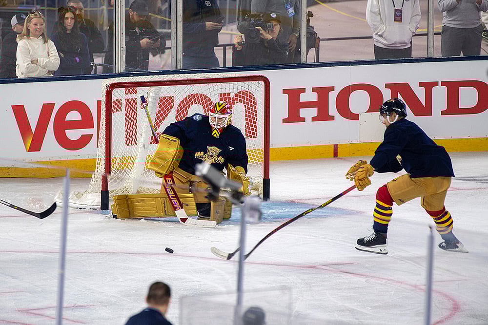 Florida Panthers goalie Sergei Bobrovsky, center, workds out during practice for the NHL Winter Classic outdoor hockey game at loanDepot Park, in Miami.  - | Photo: AP/Michael Laughlin