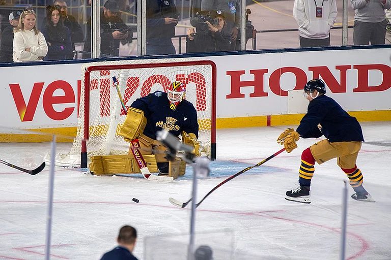 Florida Panthers goalie Sergei Bobrovsky, center, workds out during practice for the NHL Winter Classic outdoor hockey game at loanDepot Park, in Miami. - | Photo: AP/Michael Laughlin