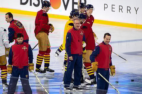 Florida Panthers coach Paul Maurice, center, shouts instructions to his players during practice for the NHL Winter Classic outdoor hockey game at loanDepot Park in Miami. 